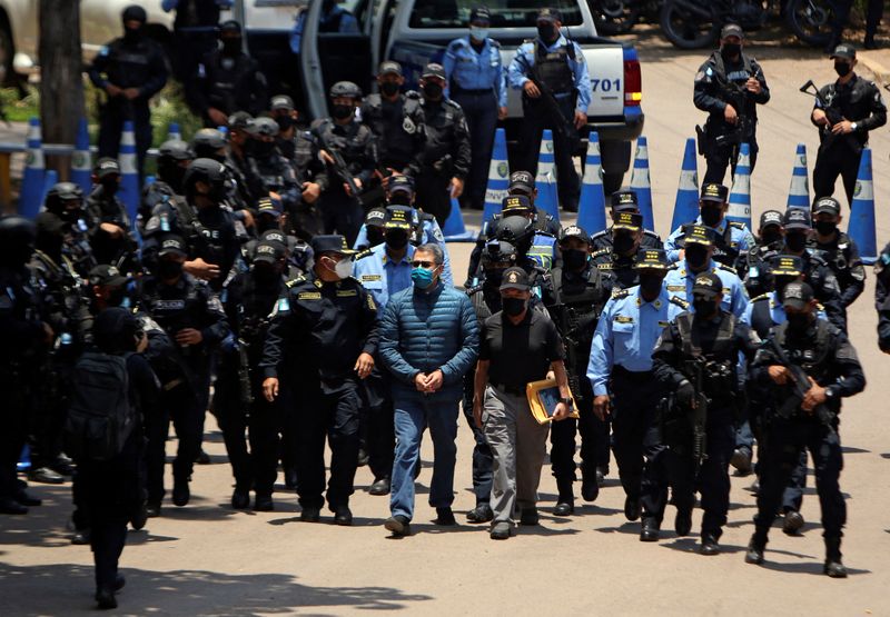 Honduras extradite former President Juan Orlando Hernandez is being transported