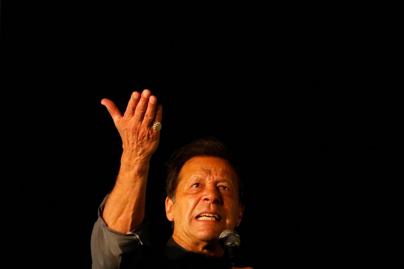 Ousted Pakistani Prime Minister Imran Khan gestures as he addresses