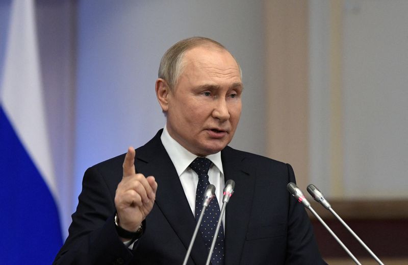 Russian President Vladimir Putin delivers a speech during a meeting