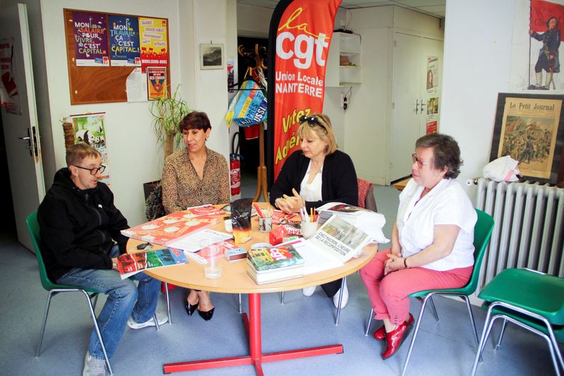 French CGT labour union members prepare the Labour Day protest