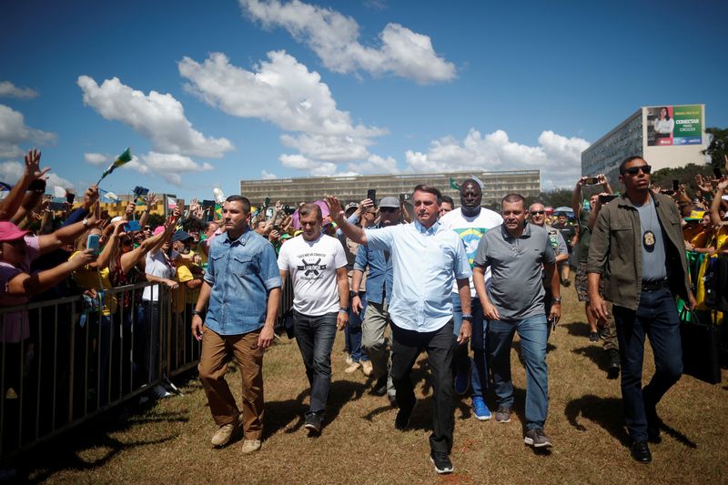 Brazilian President Jair Bolsonaro meets supporters during a the demonstration