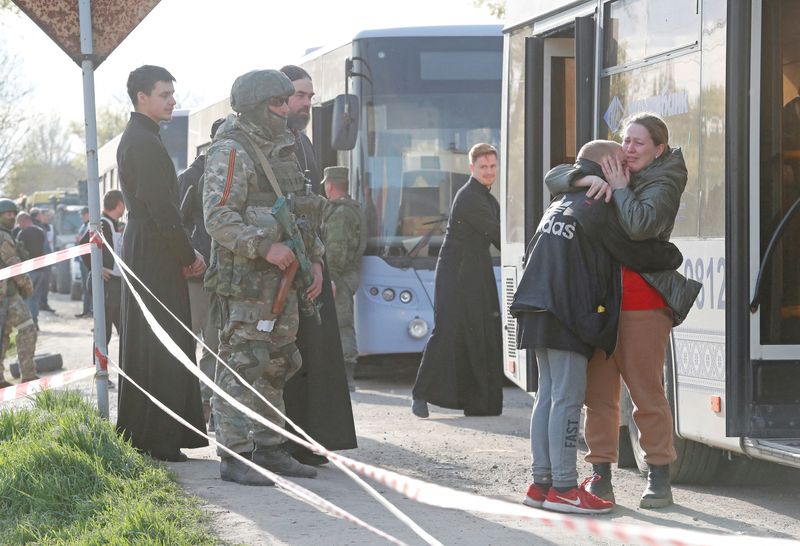 Evacuees from Mariupol arrive at a temporary accommodation centre in