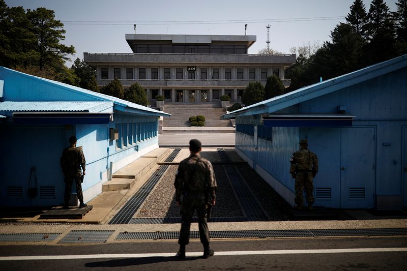 FILE PHOTO: South Korean soldiers stand guard at the truce