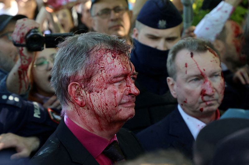 FILE PHOTO: Russia’s ambassador to Poland Sergey Andreev is covered
