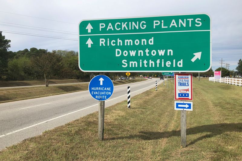FILE PHOTO: A road sign directs traffic to Smithfield Foods’