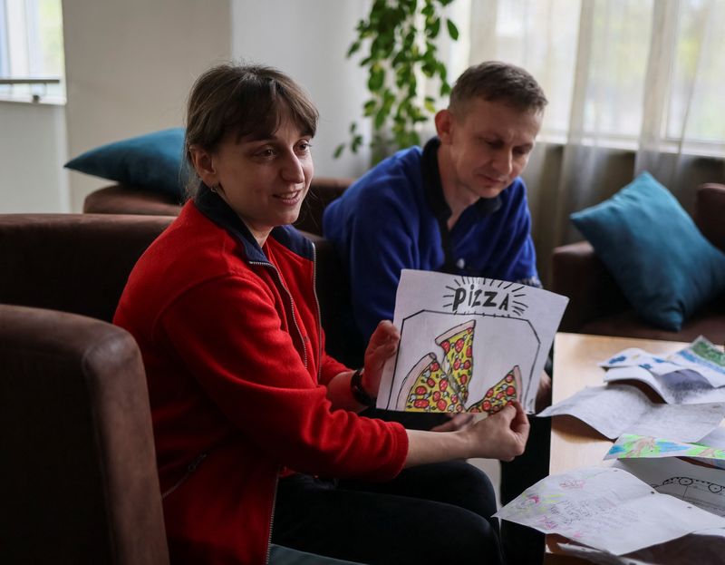 Nataliya and Volodymyr Babeush attend an interview with Reuters in