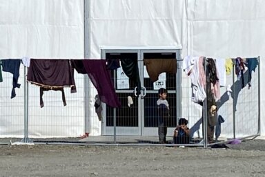A structure housing Afghan evacuees is seen at Joint Base