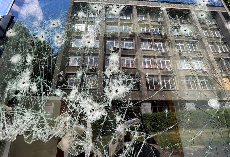 Aftermath of a shelling at residential area, as Russia’s attack