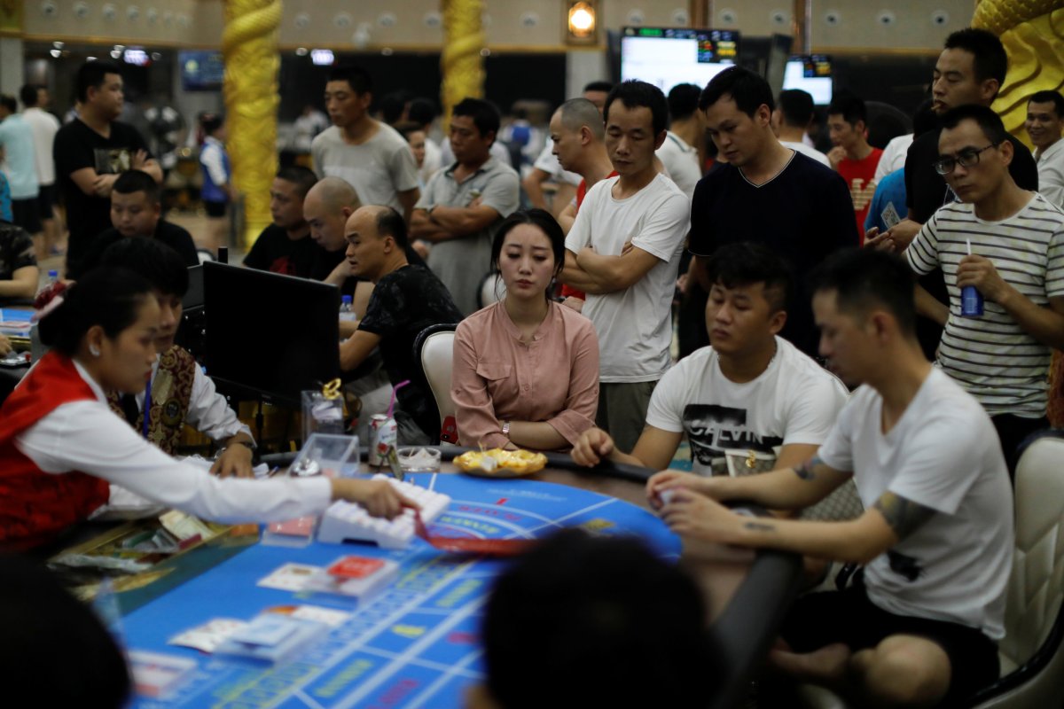 The Wider Image: In Cambodian casino town, Chinese bet on