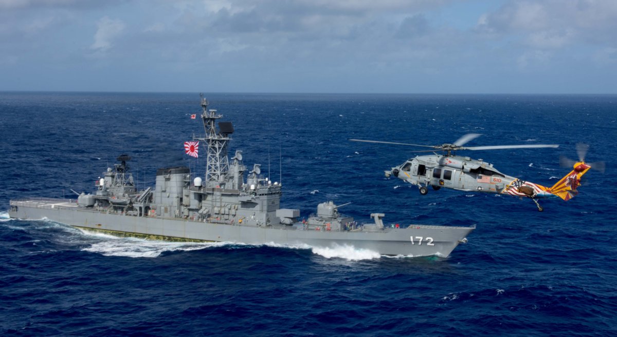 FILE PHOTO: A U.S. MH-60S Sea Hawk flies by Japan’s
