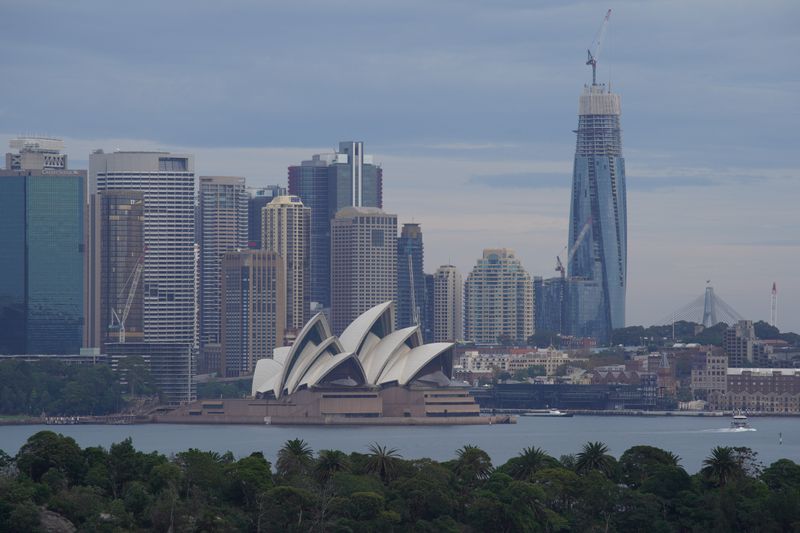 The Sydney Opera House and city centre skyline are seen