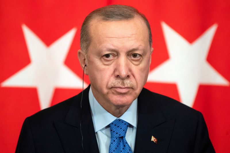 FILE PHOTO: Turkish President Tayyip Erdogan attends a joint news