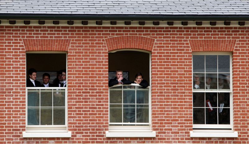 FILE PHOTO: Pupils watch during the visit by Britain’s Prince
