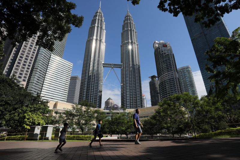 Malaysia reopens majority of businesses after a shutdown to fight