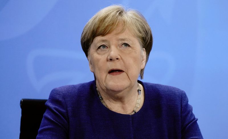 German Chancellor Angela Merkel attends a news conference on the