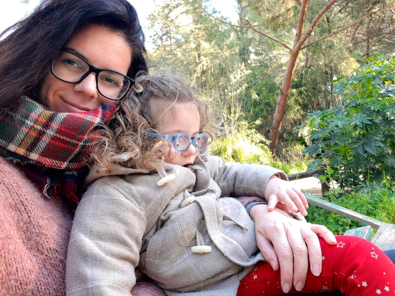 Deniz Birinci poses for a photo with her daughter Olivia