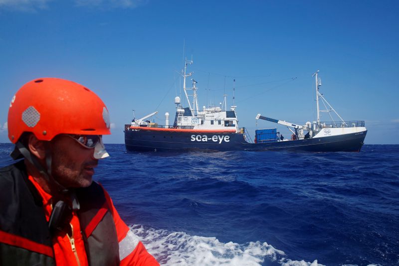 FILE PHOTO: Crew member of the German NGO Sea-Eye migrant