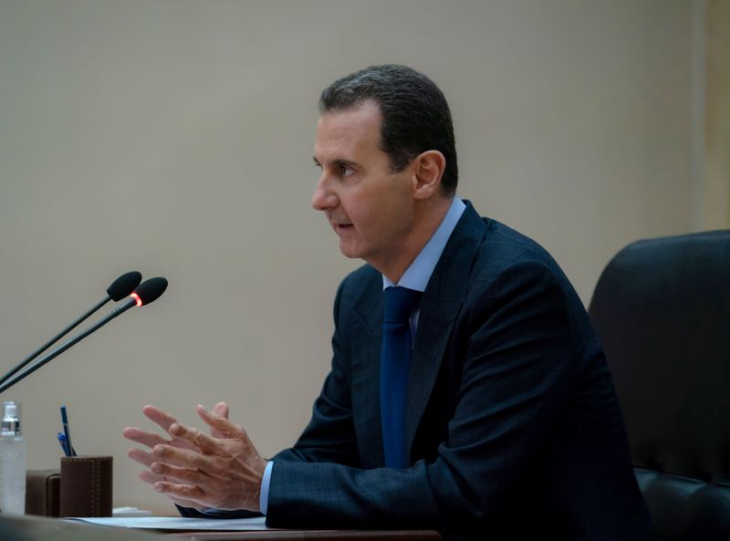 FILE PHOTO: Syrian President Bashar al-Assad addresses the government committee