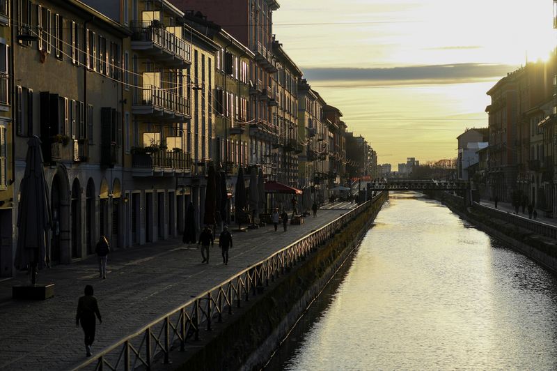 A sunset in Navigli district is seen, after a decree