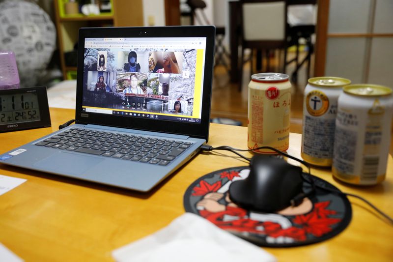 Participants of online drinking party service “Tacnom” are seen on