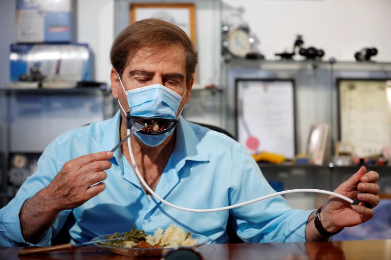 Israeli inventors develop a mask that allows diners to eat