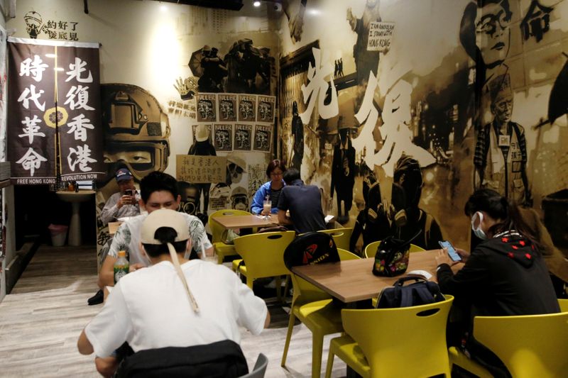 People eat lunch at Aegis, a restaurant that offer work
