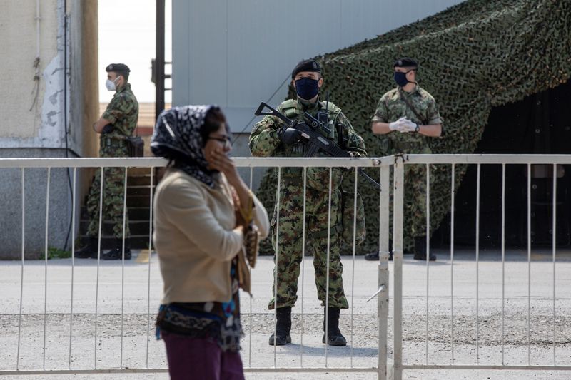 Serbia imposes greater control of migrant camps deploys soldiers in