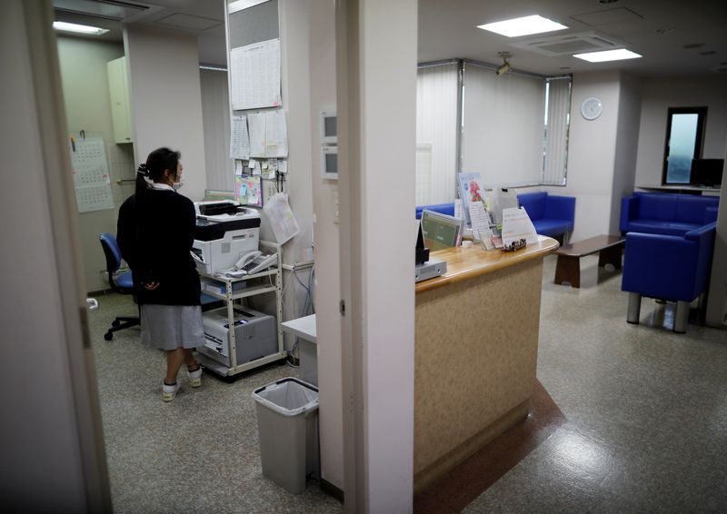 A staff member is seen at an urology clinic in