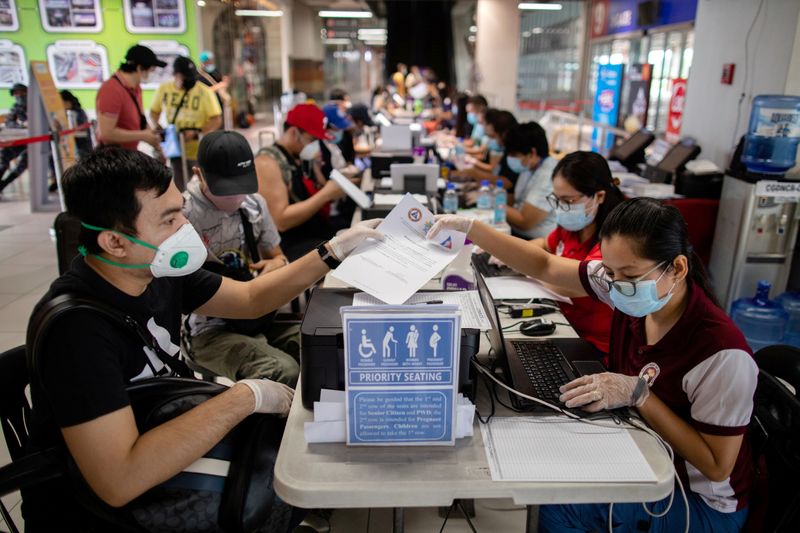 Repatriated Filipino workers stuck in quarantine amid the spread of