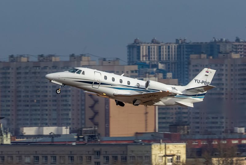 A private jet descends before landing at the Pulkovo Airport,