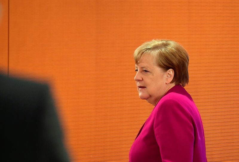 FILE PHOTO:  German Chancellor Angela Merkel arrives at the
