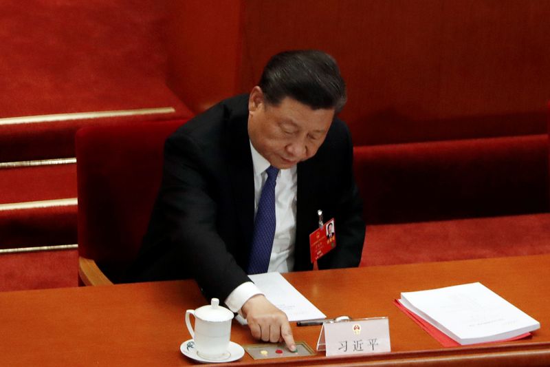 Chinese President Xi Jinping casts his vote on the national