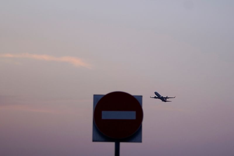 FILE PHOTO: Aircraft takes off at Hongqiao International Airport in