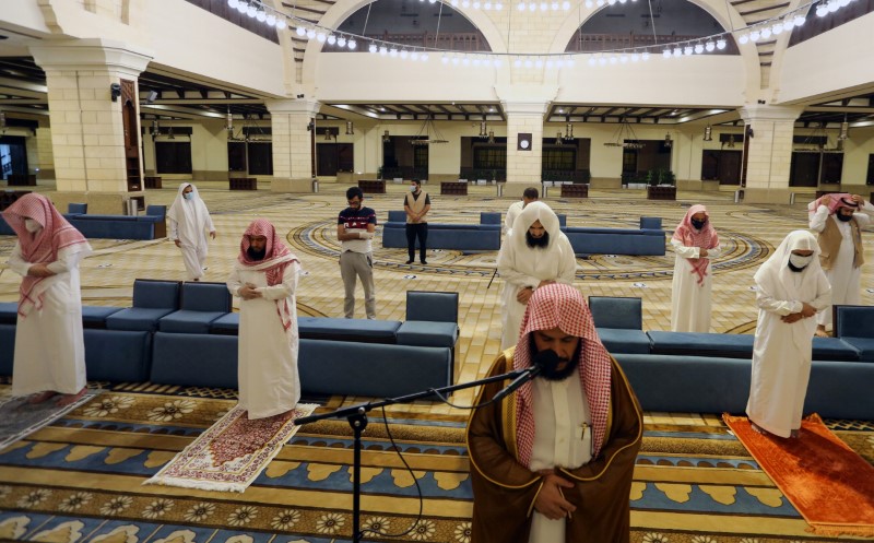 Muslims perform the Al-Fajr prayer inside the Al-Rajhi Mosque while