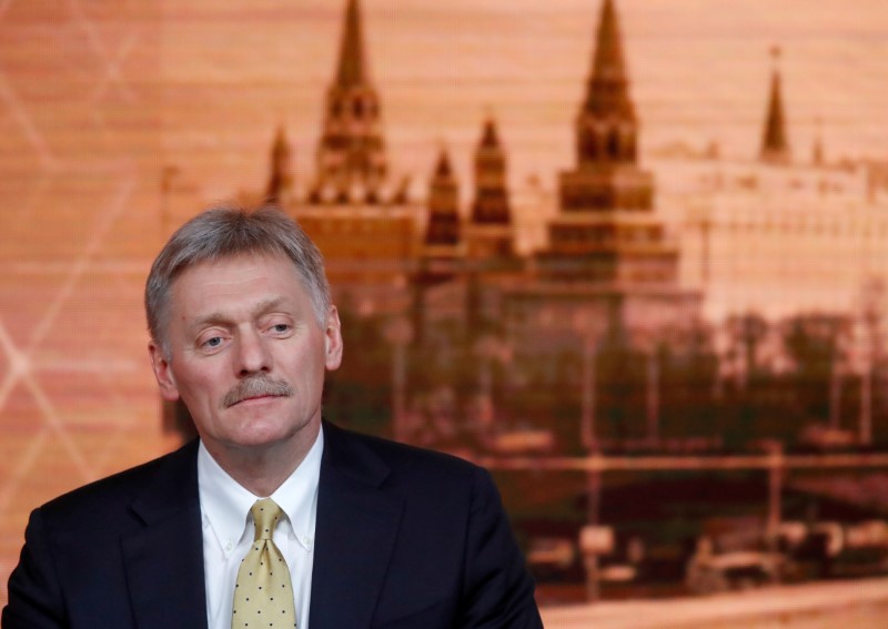 FILE PHOTO: Kremlin spokesman Dmitry Peskov listens during Russian President