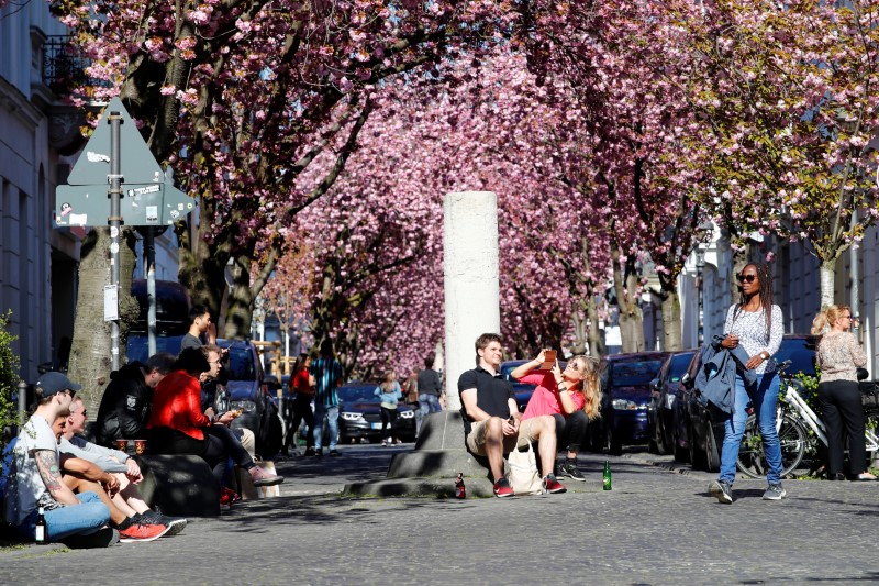 FILE PHOTO: People gather in Cherry Blossom Avenue despite the