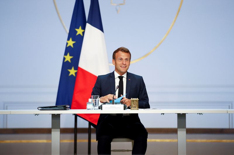 FILE PHOTO: French President Macron meets with trade unions in