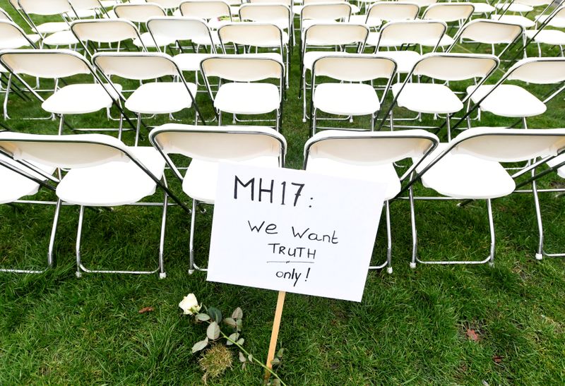 Family members of victims of the MH17 crash protest outside