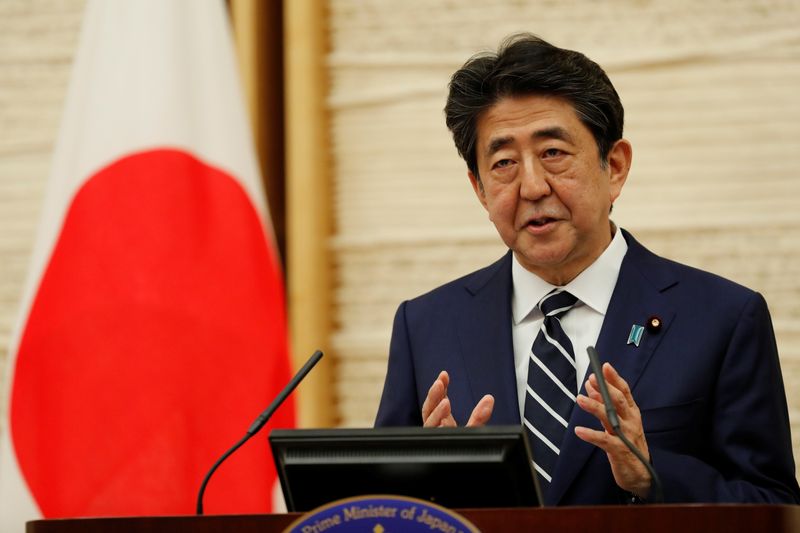 Japan’s Prime Minister Shinzo Abe speaks at a news conference