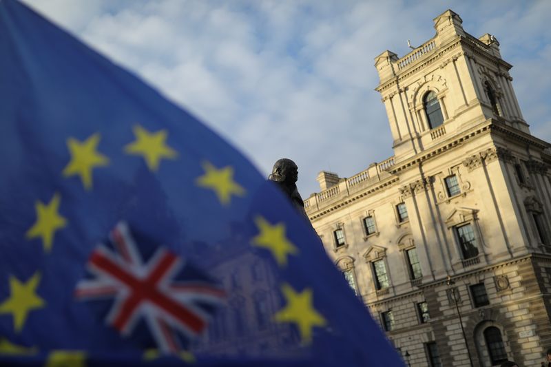 A flag is seen outside the Houses of Parliament near