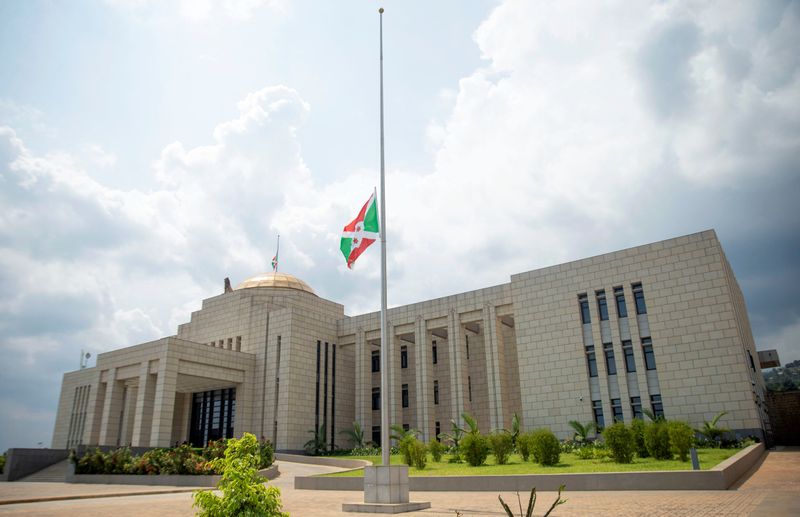 The Burundian national flag flies at half mast outside the