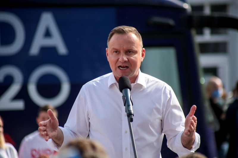 Poland’s President Andrzej Duda speaks during his election meeting in