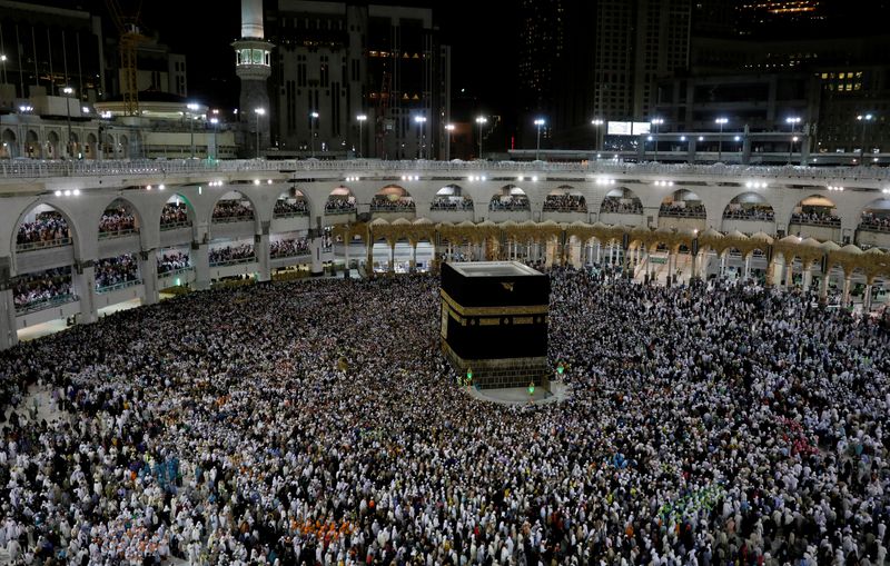 FILE PHOTO: Muslim pilgrims circle the Kaaba and pray at