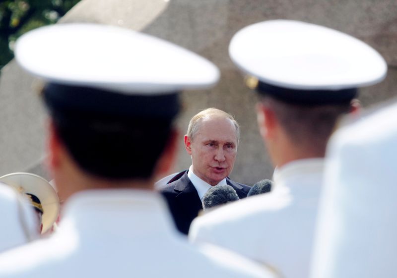 FILE PHOTO: Russia’s President Putin attends the Navy Day parade