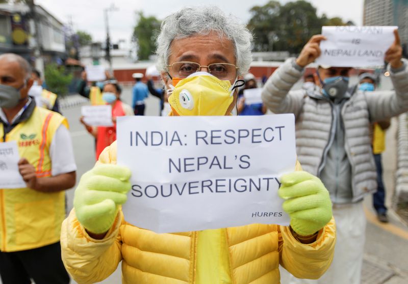 FILE PHOTO: Activists protest against the alleged encroachment of Nepal