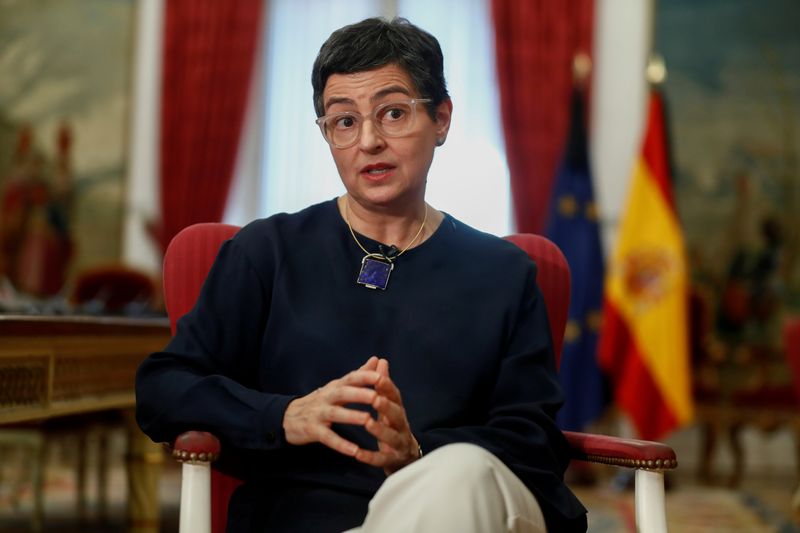 FILE PHOTO: Spanish Foreign Minister Arancha Gonzalez Laya reacts during