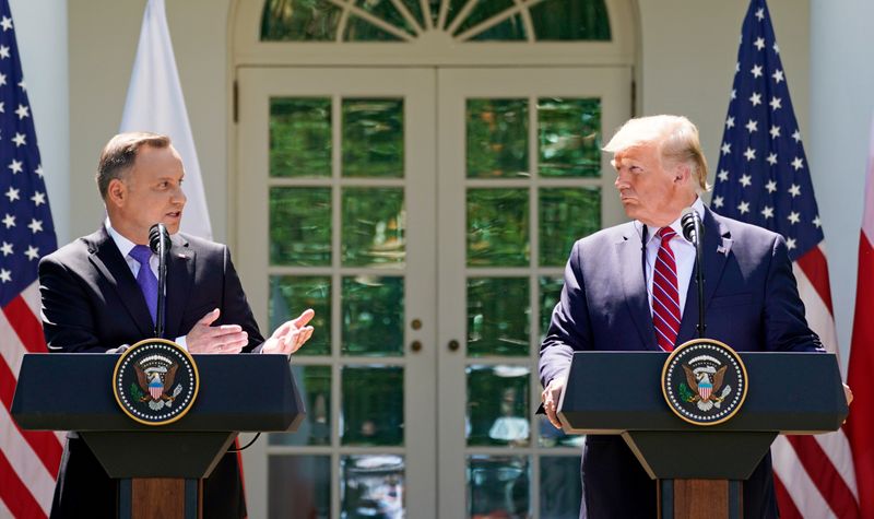 FILE PHOTO: U.S. President Trump and Poland’s President Duda hold