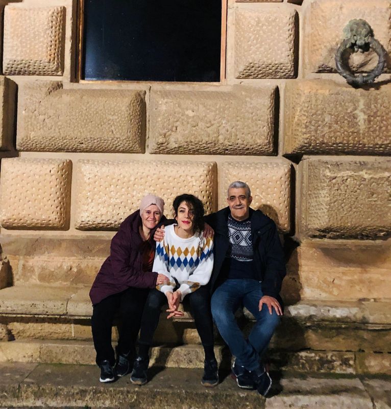 Ghada Zitouni, Isam Alkousaa pose for a picture at Alhambra