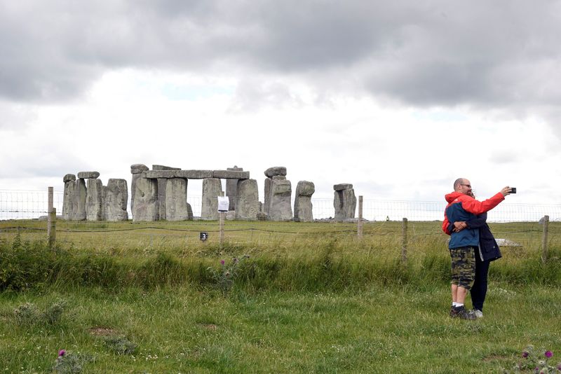 Summer Solstice celebrations at the Stonehenge stone circle amid the