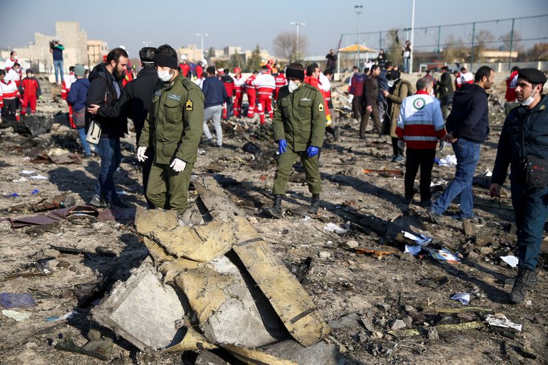 FILE PHOTO: Security officers and Red Crescent workers are seen